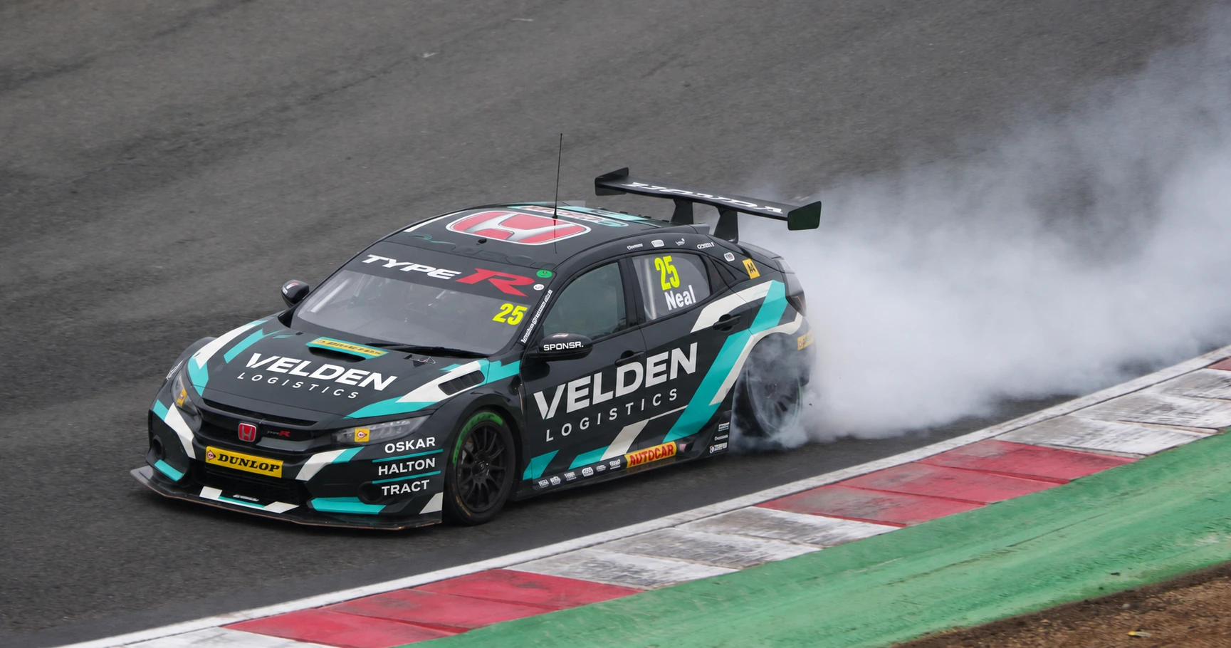 A Honda Civic touring car sliding through a corner at Brands Hatch, tyre smoke pouring off its rear wheels (SPONSR livery concept).
