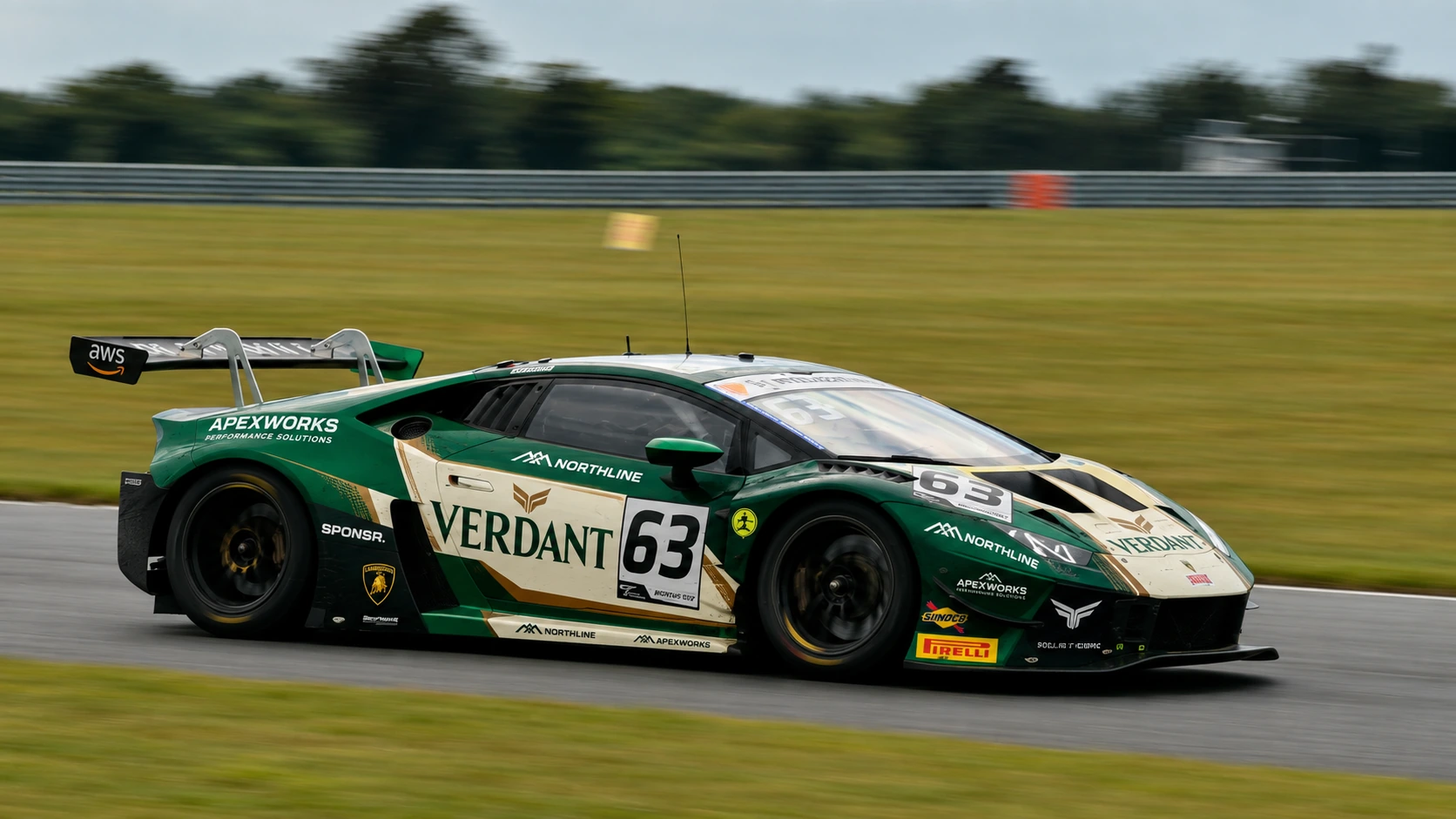 A green and cream Lamborghini GT car at speed at Snetterton (SPONSR livery concept).